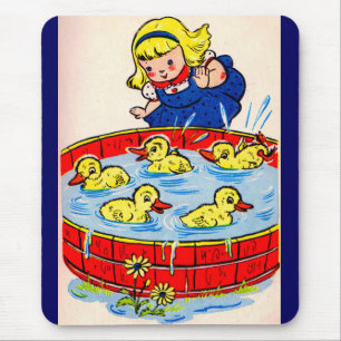cute little girl with a pool full of ducklings mouse mat
