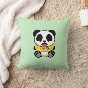 Cute Little Panda In Yellow T-shirt on Green Cushion