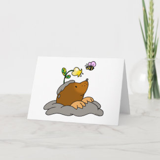 cute mole cartoon with a flower bee card
