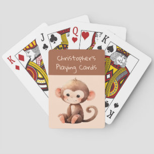 Cute monkey brown peach kids playing cards