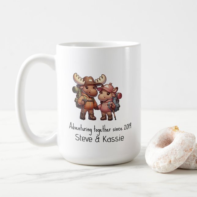Cute Moose Couple Adventuring Together Hiking Coffee Mug (With Donut)