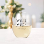 Cute Mr and Mrs Newlywed Stemless Wine Glass<br><div class="desc">Gift for the newlyweds. Cute typography script font that says "Mr. & Mrs" with stars around. You can add your family name and wedding date below.</div>