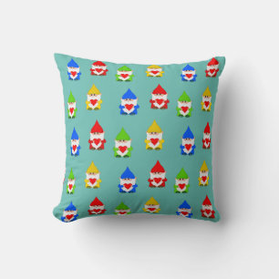Cute multicolored gnomes on teal cushion