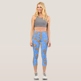 Cute orange goldfish on blue cartoon illustration capri leggings