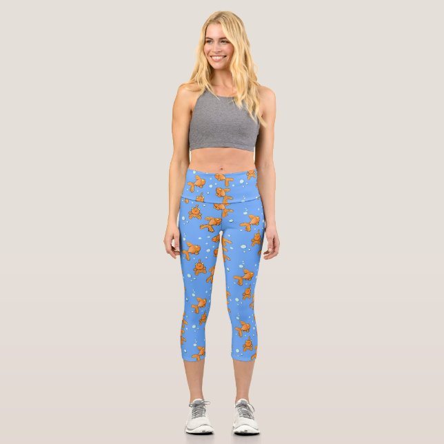 Cute orange goldfish on blue cartoon illustration capri leggings (Front)