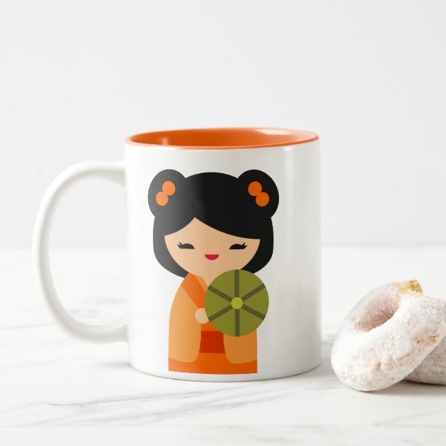 Cute orange Kokeshi Japanese dolls Two-Tone Coffee Mug (With Donut)