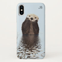 Cute Otter Standing in a Pond Holding his Face