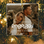 Cute Our First Christmas engaged Photo Ceramic Ornament<br><div class="desc">A modern typography for this photo ornaments collection for newly engaged couples. To customize with your favorite picture. You can also easily change the color of the font to your liking.</div>