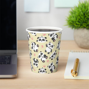 Cute panda bear paw cream background paper cups
