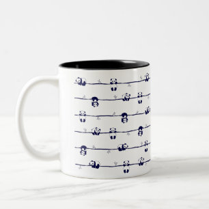 Cute Panda hanging on branches  Two-Tone Coffee Mug