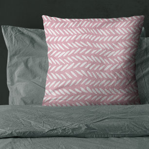 Cute pastel herringbone pattern on pink cushion