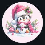 Cute Penguin and Snowman Pink Christmas Classic Round Sticker<br><div class="desc">Create unique pink Christmas stickers for mailing seals or favours with a girly design that features a cute penguin in a pink Santa hat and scarf,  sitting with a small snowman among festive greenery and ornaments.</div>