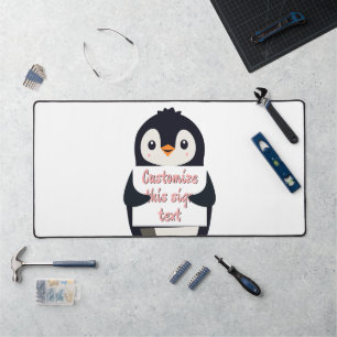 Cute penguin holding a sign for personalized text desk mat