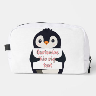 Cute penguin holding a sign for personalized text dopp kit
