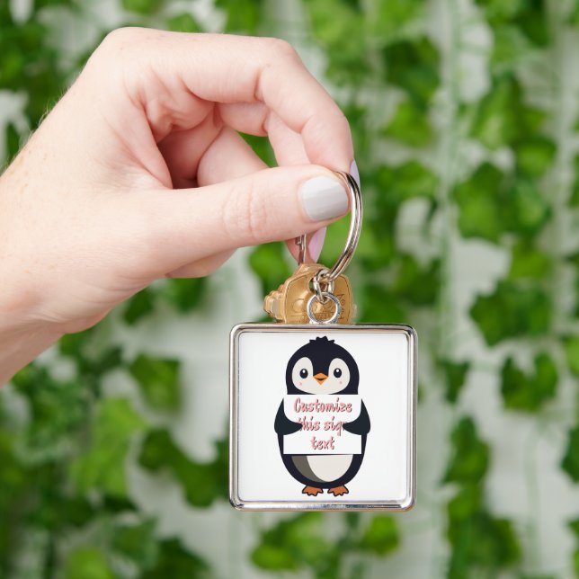 Cute penguin holding a sign for personalized text key ring (Hand)