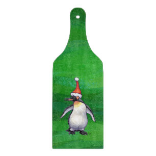 Cute Penguin in Santa Hat on Green Cutting Board