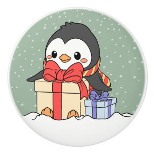 Cute penguin with Christmas gifts in the snowfall  Ceramic Knob