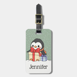 Cute penguin with Christmas gifts in the snowfall Luggage Tag