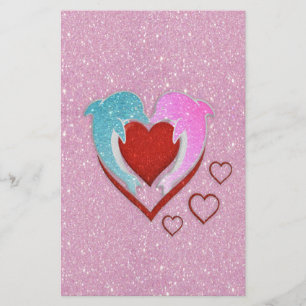 Cute pink blue dolphins holding a red heart