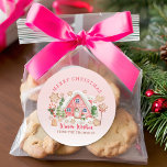 Cute Pink Candy Gingerbread House Merry Christmas Classic Round Sticker<br><div class="desc">Add a sweet, festive touch to your holiday gifts with our Cute Pink Candy Gingerbread House Merry Christmas Label, featuring a charming gingerbread house, a festive cookie, and the cheerful quote “Merry Christmas & Warm Wishes.” This label can be personalised with a name, making it a delightful way to send...</div>