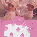 Cute Pink Cupcakes Pattern Kid's Name  Apron<br><div class="desc">Cute cupcakes apron for kid's. Decorated with a pretty and colourful pattern made with of pink cup cakes with sprinkles. Encourage  little bakers with our cute cupcakes  personalised kid's kitchen apron. It's a great gift for young ones who loves to bake or eat cupcakes and  indulge in sweet treats.</div>