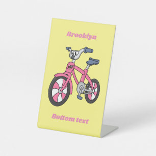 Cute pink kids bicycle cartoon illustration pedestal sign