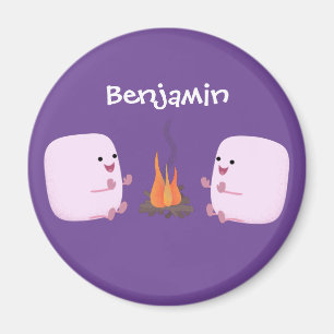 Cute pink marshmallows by camp fire cartoon magnet