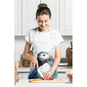 Cute puffin in blue watercolor apron