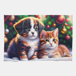 Cute puppy and cat under Christmas tree Tea Towel
