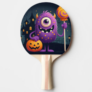 Cute, purple trick-or-treating monster ping pong paddle
