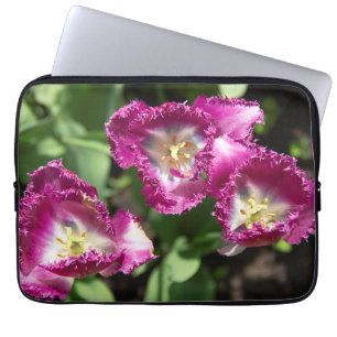 Cute purple tulips in the garden laptop sleeve