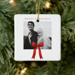 Cute Red Bow Photo Merry Christmas Ceramic Ornament<br><div class="desc">Cute Christmas ornament featuring a simple and minimalist design with a red bow over the bottom of your favourite square photo.  At the top is the greeting "Merry Christmas".</div>