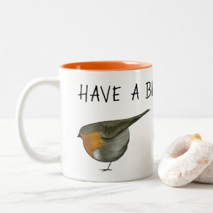 Cute red robin bird coffee mug illustration