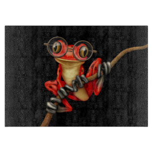 Cute Red Tree Frog with Eye Glasses on Black Cutting Board