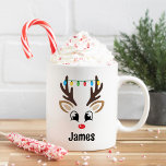 Cute Reindeer Face Personalised Name Christmas Coffee Mug<br><div class="desc">Cute Christmas coffee or hot cocoa mug features an illustration of a sweet reindeer boy face with a shiny red nose and colourful Christmas bulb string lights hanging from his antlers. Personalise this festive hot chocolate mug with a first name or other custom text. Makes a fun holiday gift for...</div>