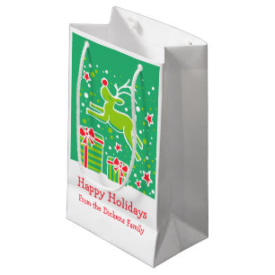 Cute reindeer prancing over christmas gifts bag