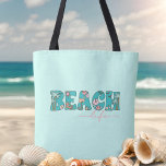 Cute Retro Beach Life Blue Tote Bag<br><div class="desc">This stylish tote bag features whimsical 1970s retro-style text in pastel shades of aqua blue, pink, and yellow on a light aqua background. The colourful "Beach Life" text includes images of cute palm trees, hibiscus flowers, seashells, and more. This fun tote has a feminine boho vibe and is perfect for...</div>