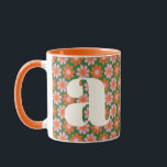 Cute Retro Flowers Green Pink Monogram Custom Mug<br><div class="desc">Add a dose of cheerful retro charm to your coffee routine with this personalised monogram mug. Featuring a playful 1970s-inspired daisy pattern in green, pink, and orange, it’s perfect for anyone who loves bold colour and vintage design. The oversized letter adds a fun custom touch—ideal for birthdays, dorm decor, or...</div>