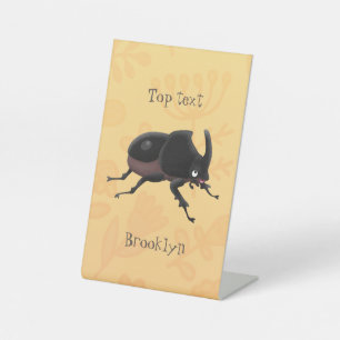 Cute rhinoceros beetle cartoon illustration pedestal sign