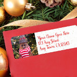 Cute Rustic Snowman Red Script Custom Name Holiday<br><div class="desc">A close-up photo of a happy and cute, rustic log snowman, wrapped in a red and white striped scarf against lighted trees helps you usher in Christmas and New Year. Feel the warmth and joy of the holiday season whenever you use this fun and unique custom return address label. Matching...</div>