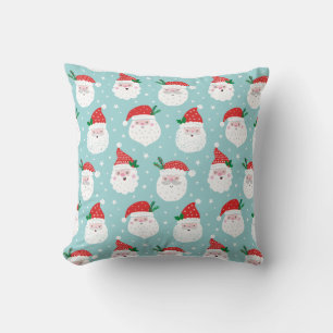 Cute Santa heads on light blue Cushion
