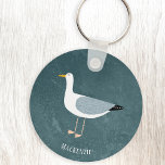 Cute Seagull Name Key Ring<br><div class="desc">A cheeky seagull standing by the ocean. Perfect for those who love sassy birds and the coast.
Personalise by changing or removing the name.</div>