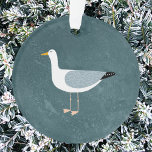 Cute Seagull Ornament<br><div class="desc">A cheeky seagull standing by the deep green ocean. Perfect for those who love sassy birds and the coast.</div>