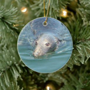 Cute Seal swimming in the Ocean Christmas Keepsake Ceramic Tree Decoration