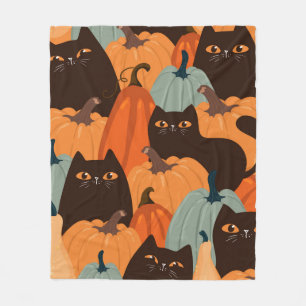 Cute seamless pattern with black cats and pumpkins fleece blanket
