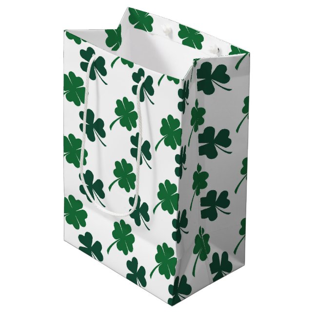 Cute shamrocks four leaf clovers tiled pattern medium gift bag (Front Angled)