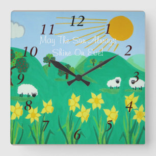 cute sheep with trees hills blue sky and daffodils square wall clock
