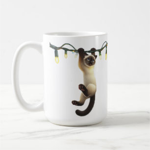 CUTE SIAMESE KITTEN HANGING FROM HOLIDAY LIGHTS COFFEE MUG