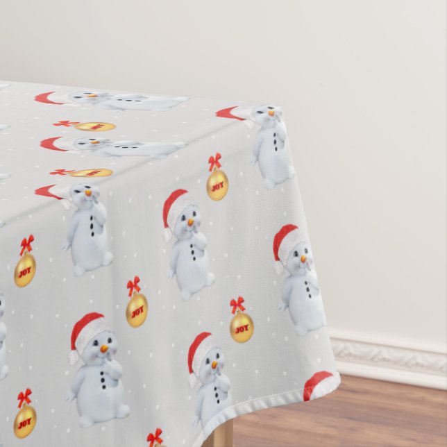 Cute Snowman and Golden Ball on Light Silver Grey Tablecloth (In Situ)