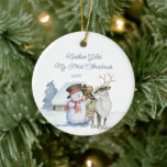 Cute Snowman and Reindeer First Christmas Ceramic Ceramic Tree Decoration<br><div class="desc">Baby first Christmas photo ornament with a cute snowman and reindeer in front of a warmly lit cabin in the snow. The template is ready for you to edit the text on the front and add your favourite photo on the back. The photo is displayed in square shape, so if...</div>